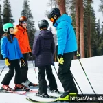 스키 강사의 업무와 학습 조화 - A professional ski instructor teaching a diverse group of students on a snowy mountain slope during ...